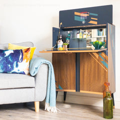 Cocktail cabinet with sofa and drinks