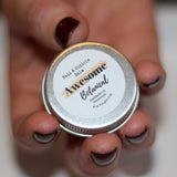 Woman holding Nail & Cuticle Balm