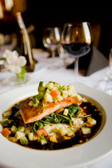 Food on a table with white table cloth in a restaurant