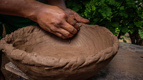 A clay base is made to build up the raw clay forms