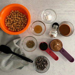 ingredients portioned out in to bowls for chocolate chip chai muffins using kimbala chai concentrate