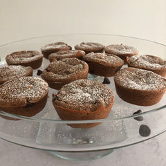 finished chocolate chip chai muffins using kimbala chai concentrate, removed from muffin tin and arranged on a glass platter