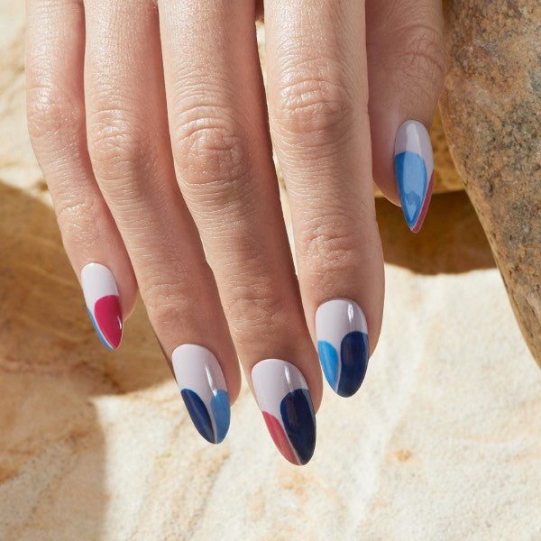 hand showing blue and pink nail art