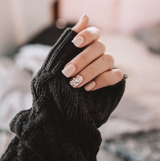 Light pink nails with rhinestones