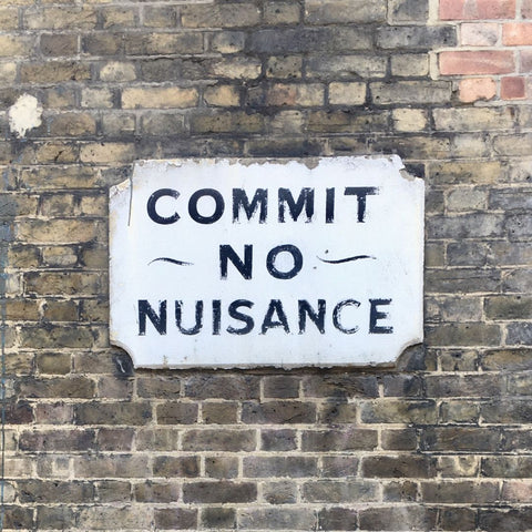 Commit no nuisance street sign