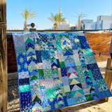 Sea glass quilt stitched by Dotty and Grace