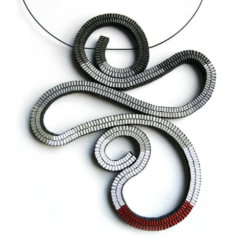 Abstract shaped necklace made of red, silver and gray paper