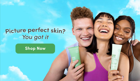 young people holding skincare products