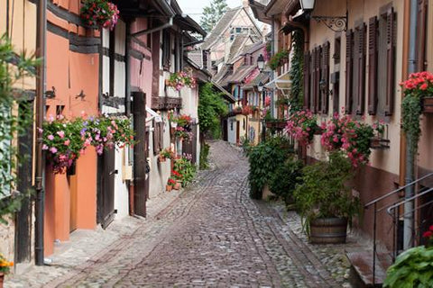 A typical cobblestone walking street in Alsace.