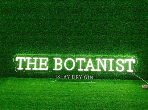 LED neon sign displaying 'THE BOTANIST ISLAY DRY GIN'