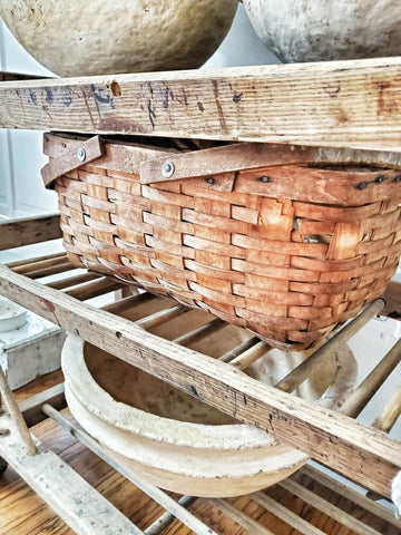 Flea market finds for fall home decor including baskets, ironstone, and grain