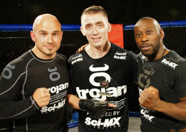Owners Dan Richards left and Paul Sutherland (right) with one of their fighters