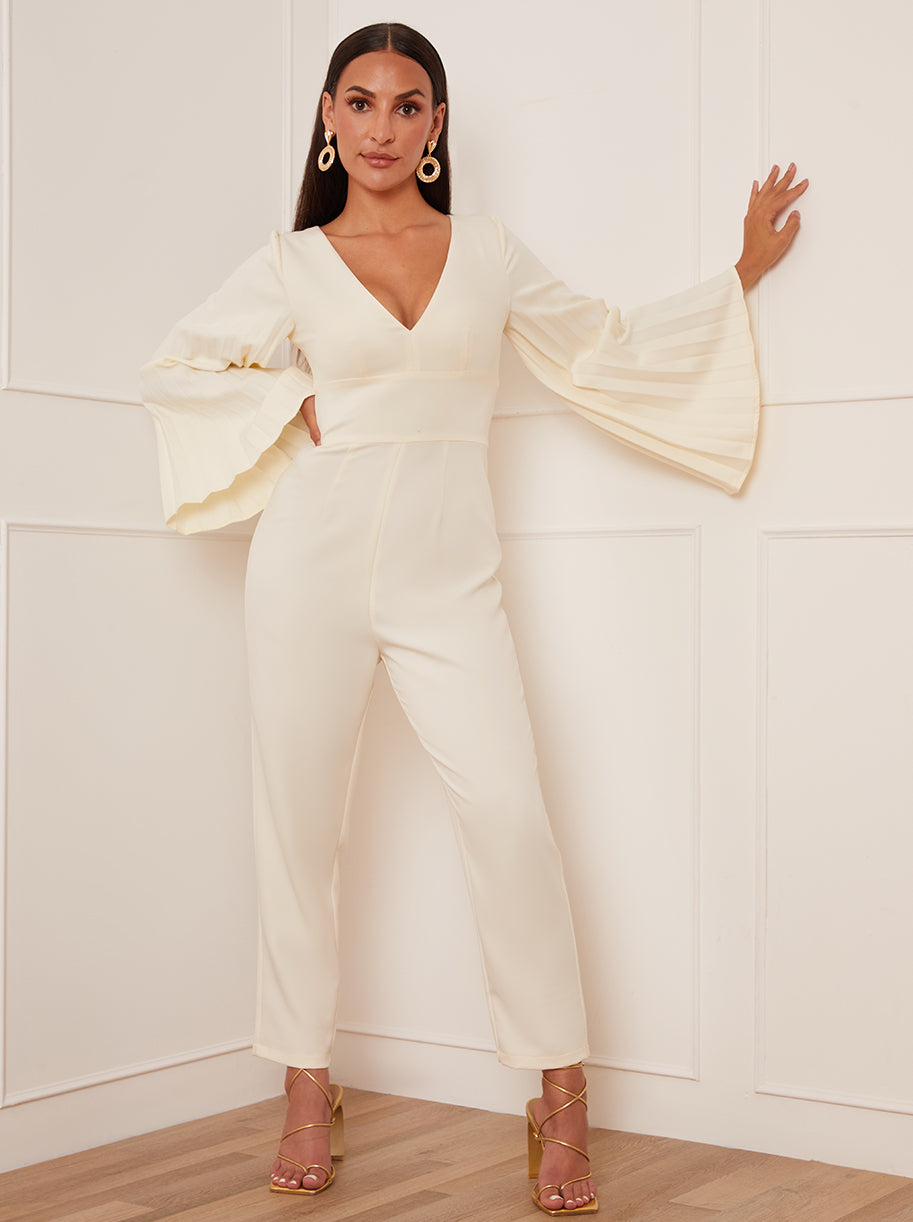 Chi Chi Petite Long Bell Sleeve Pleated Jumpsuit in Cream in Neutrals, Size 8