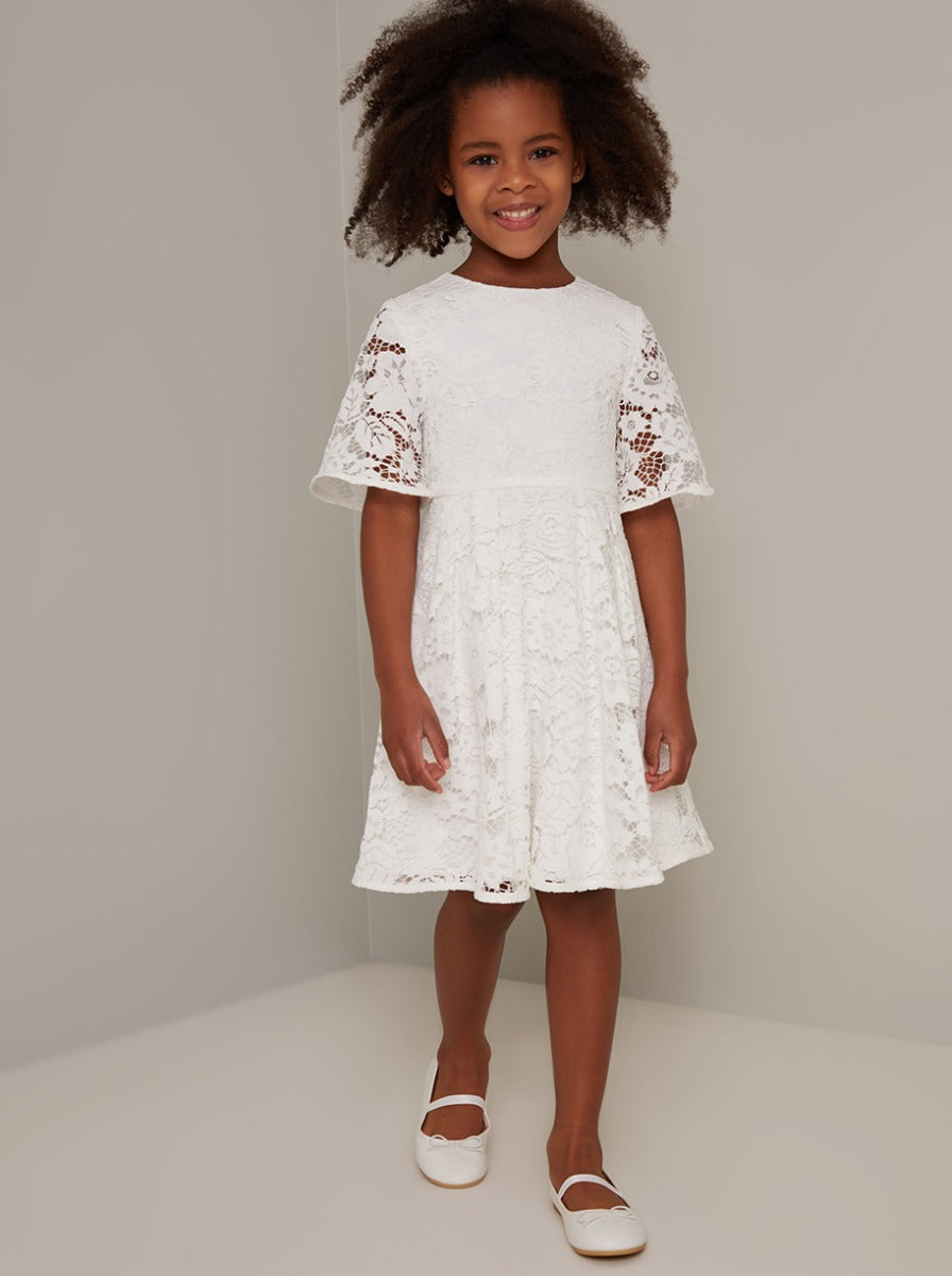 Chi Chi Short Sleeved Lace Overlay Dress in White, Size 4 Years