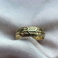 Vintage 9K gold etched band ring in pink jewellery cloth.