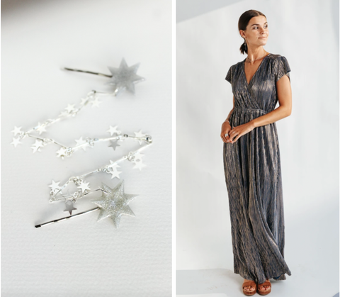 star pins with a star chain connecting and a silver maxi dress