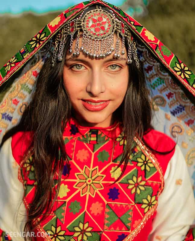 How One Afghan Woman Is Embracing Her Traditional Dress Vogue ...