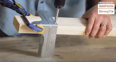 screwing corner connector into 2x4 for workbench