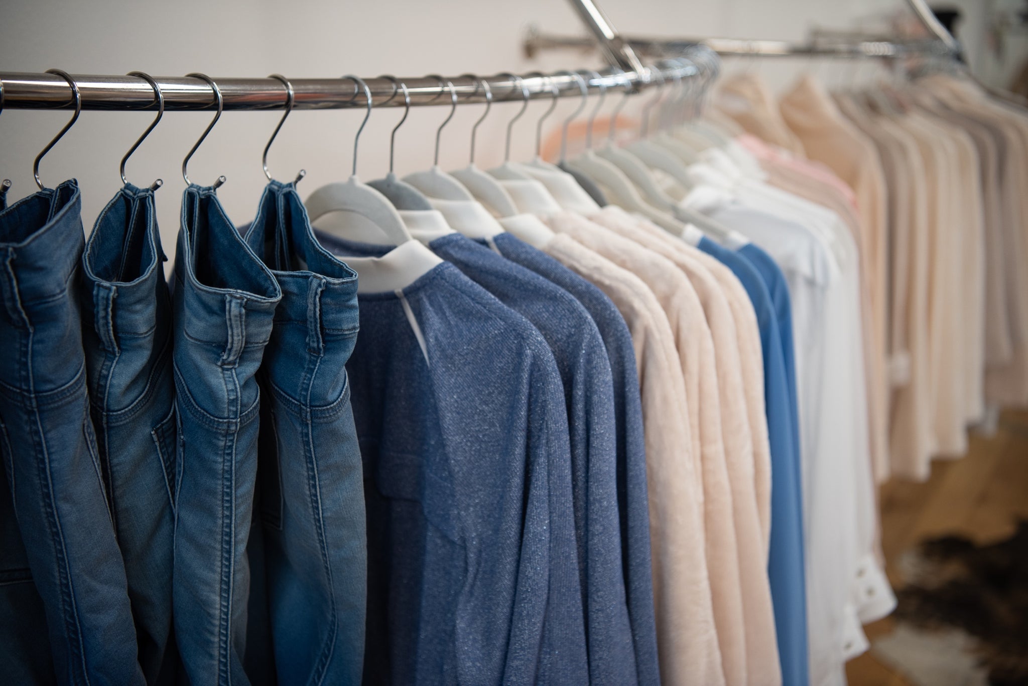 image of inlarkin clothing on the rack in the flagship store in santa ynez showing some of the options for the style sessions