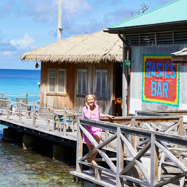 Mariella Frostrup travel writer in Mustique for Daily Telegraph wearing Lotty B at Basil's Bar
