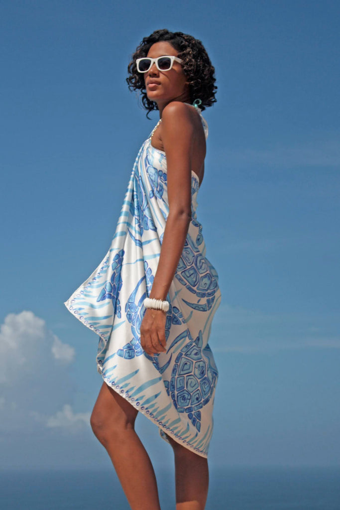 Sarong worn as dress styled with jewellery