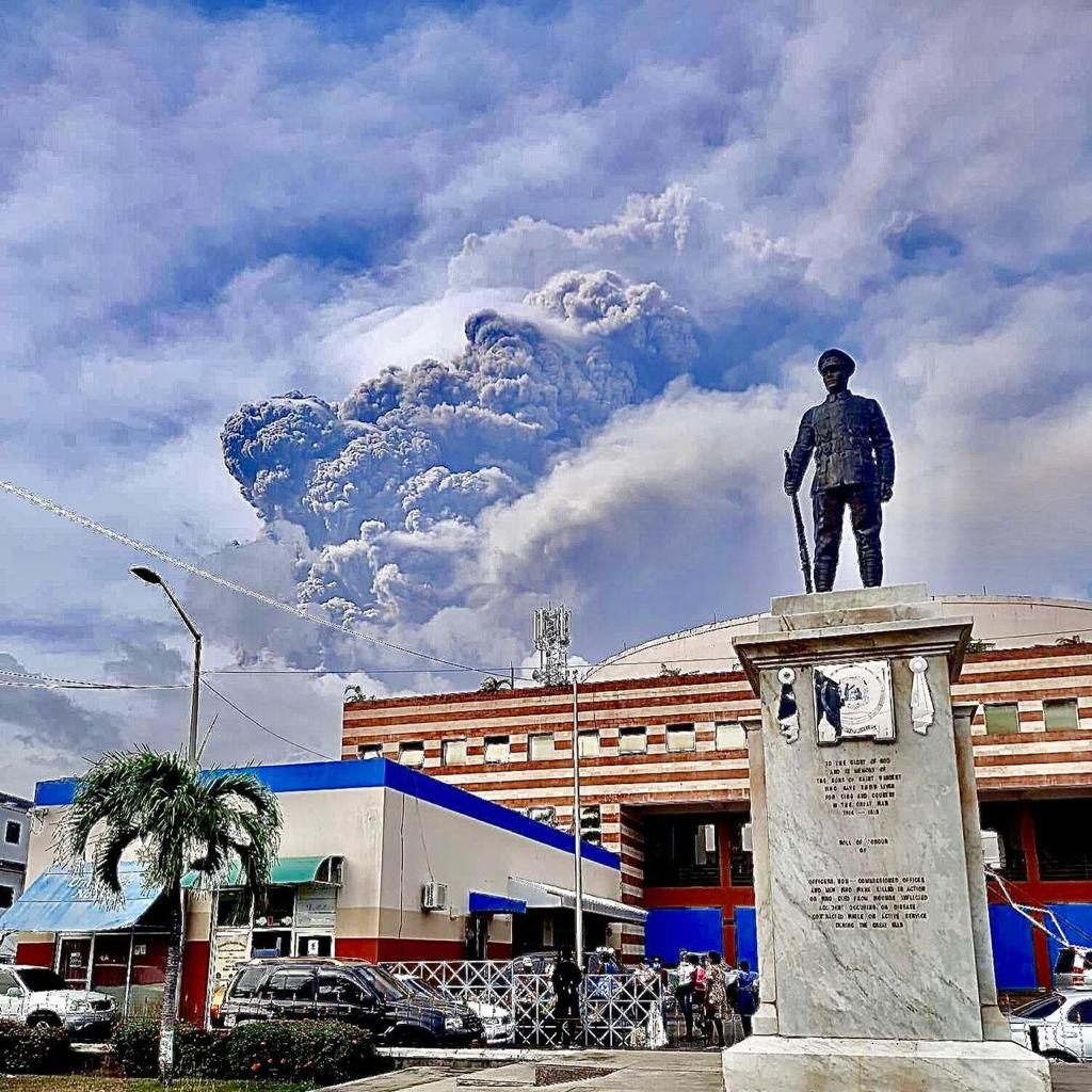 St Vincent Statue with the volcano eruption behind