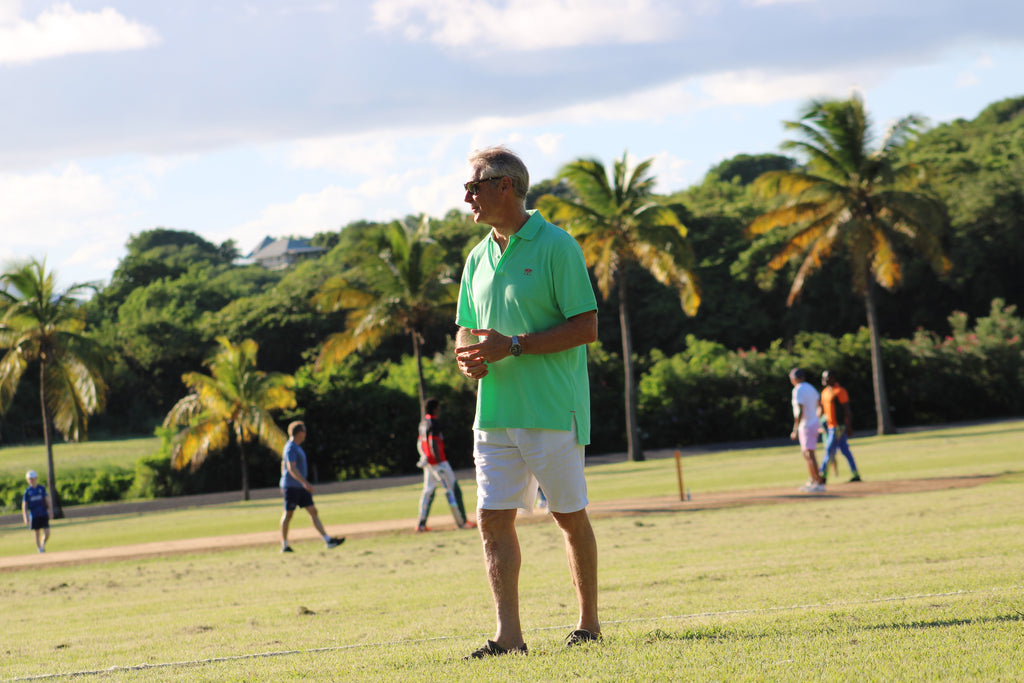 Dr B sporting Lotty B designed polo shirts for the Ashes cricket match on Mustique
