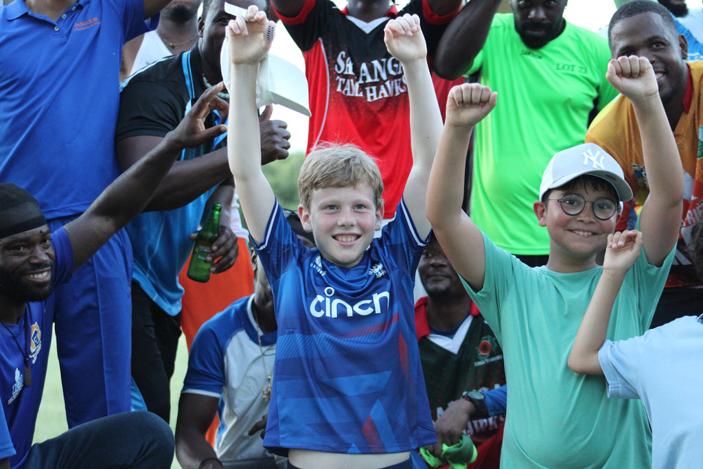Junior barmy army celebrate Mustique Ashes cricket