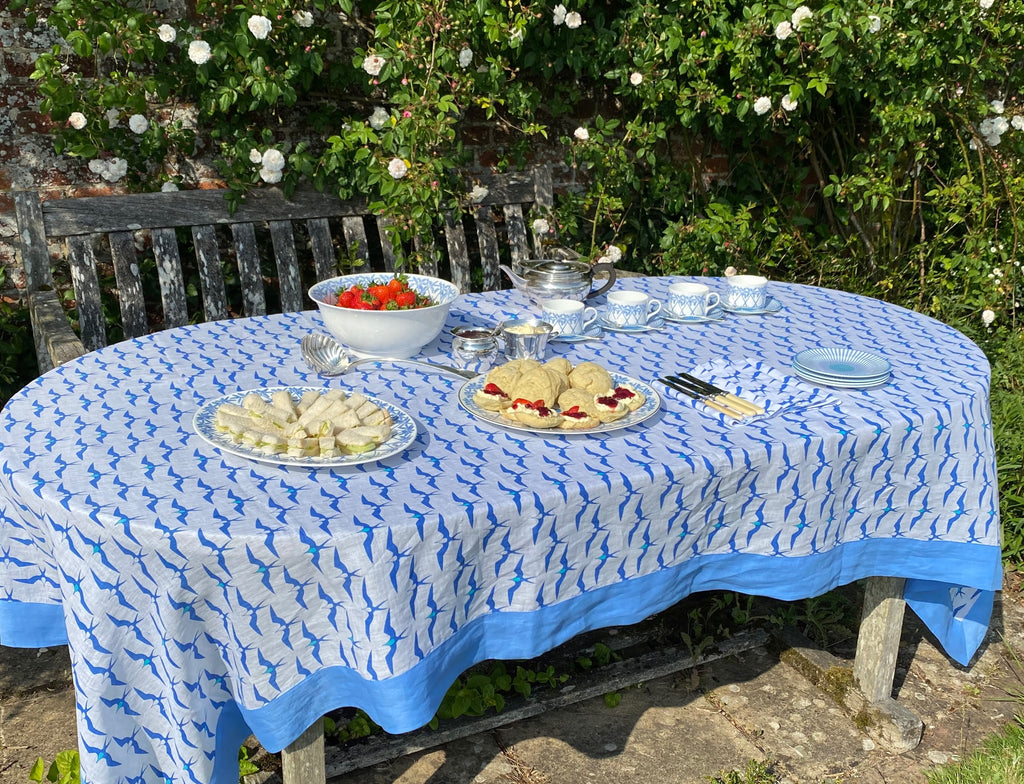 Lotty B fine bone china Palms and Coconuts dinner service on Frigate Bird tablecloth