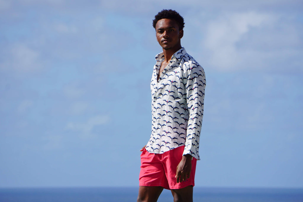 Frigate Bird linen shirt in navy and red with Pink House Mustique swim shorts