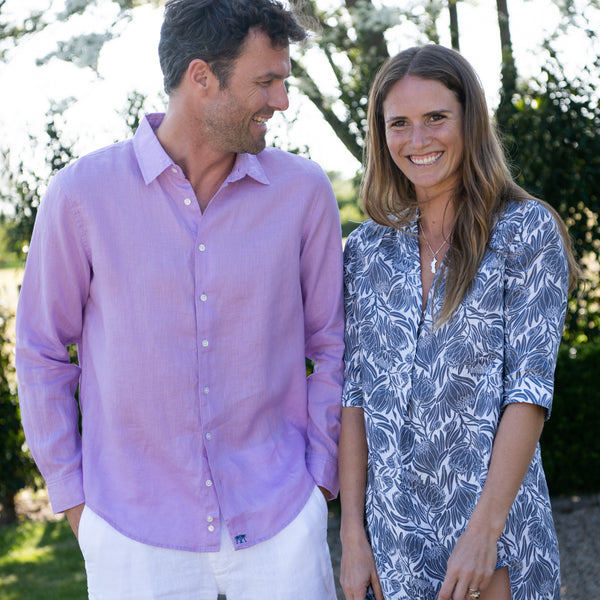 Linen shirt lilac teamed with white casual shorts, Protea print dress in aubergine
