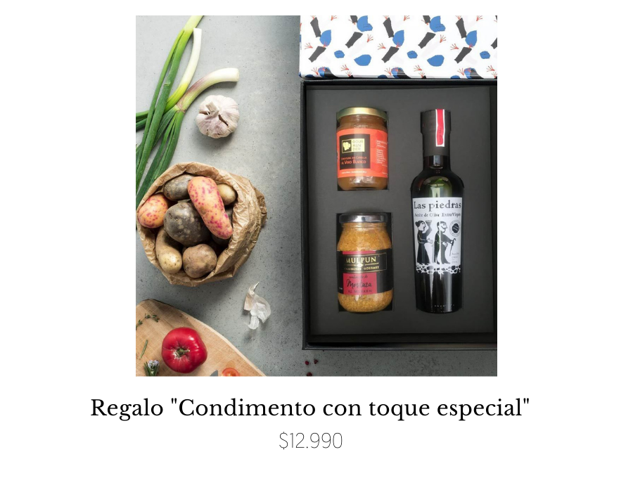 caja de regalo mercado wibai condimento con toque especial botella de aceite de oliva y condimentos acompañada con tubérculos ajo cebollín y tabla de cocina