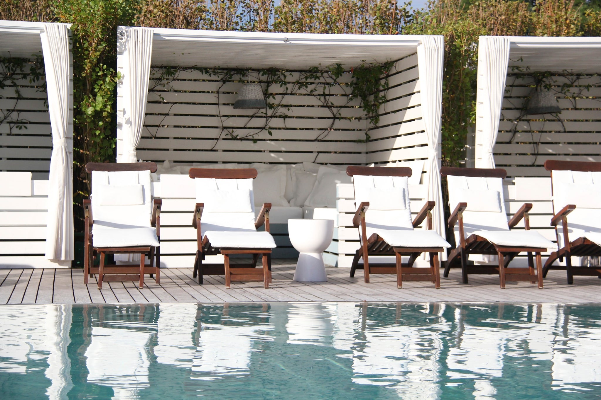 Poolside Chairs and Cabanas by MEM Interiors