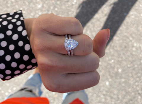 woman wearing an engagement ring upgrade