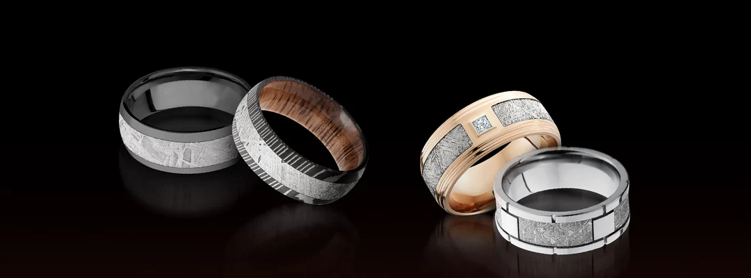 a display of a unique and innovative meteorite men's wedding bands from John Atencio