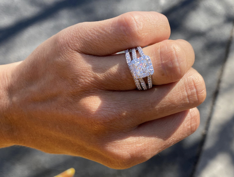 woman wearing a natural diamond engagement ring