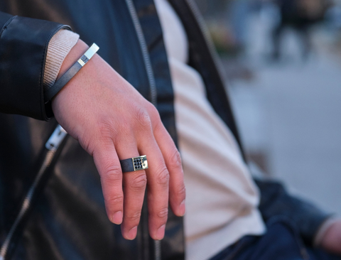 photo of a man wearing the latest bracelet and signet ring design by John Atencio