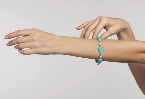 woman wearing turquoise jewelry a trending color of the year