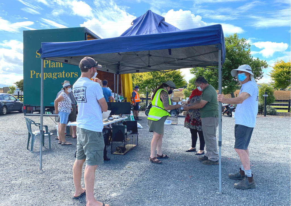 Catherine interacting with community members