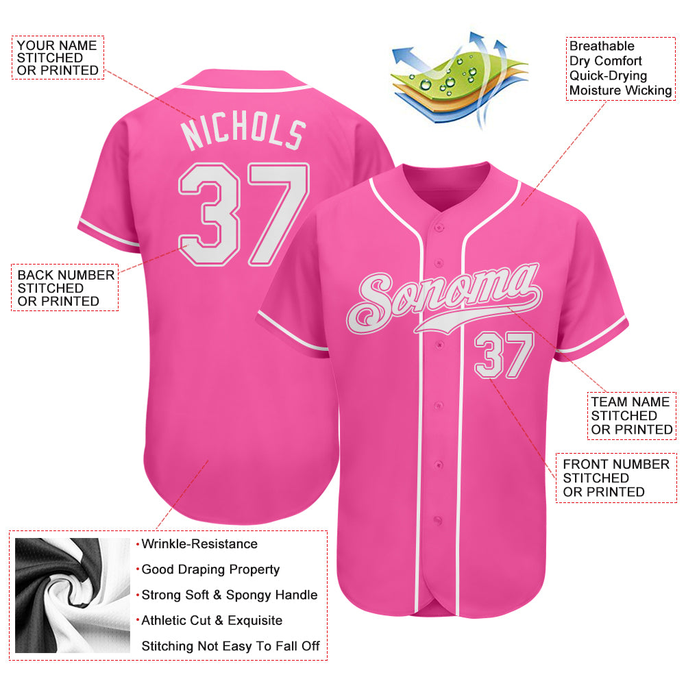 white and pink baseball jersey