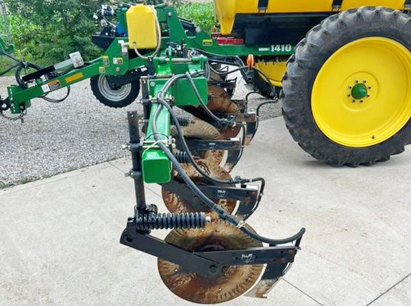 Yetter Coulters on used Farm King liquid Applicator.