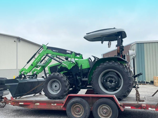 Deutz tractor on trailer