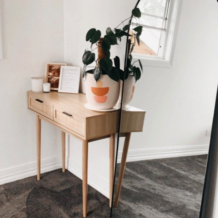 alora rattan console table