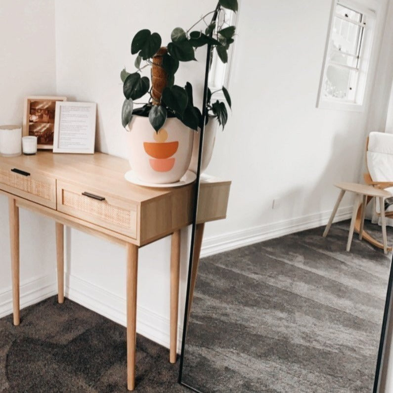 alora rattan console table