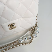 Chanel Pearl Logo Strap Flap Bag White – Tailored Styling