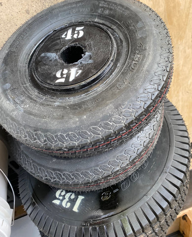 Bumper plates made with cement and tires