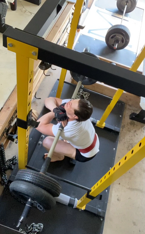 Front Squats with the Rhinoflex barbell and homemade weight tire bumper plates.