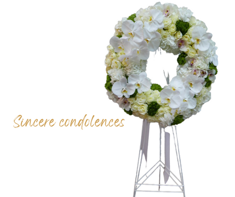 casket wreath funeral flower arrangement