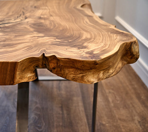 Photo of live edge wood table.