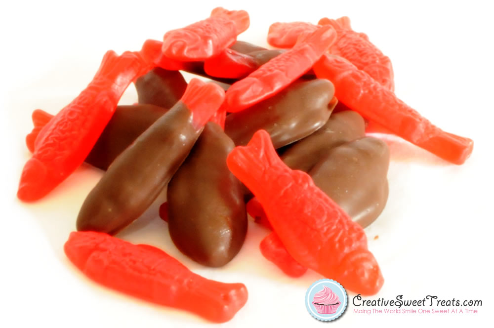 https://cdn.shopify.com/s/files/1/0278/3671/products/chocolate-covered-large-red-swedish-fish.jpg?v=1578242631